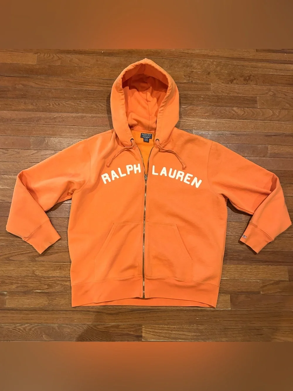 Polo Ralph Lauren full-zip hoodie with white text branding across the chest.